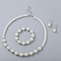 Simulated White Pearl and Resin Stretch Bracelet and Earring and Necklace 21-23 Inches in Silvertone & Stainless Steel - Sticky add to cart bar