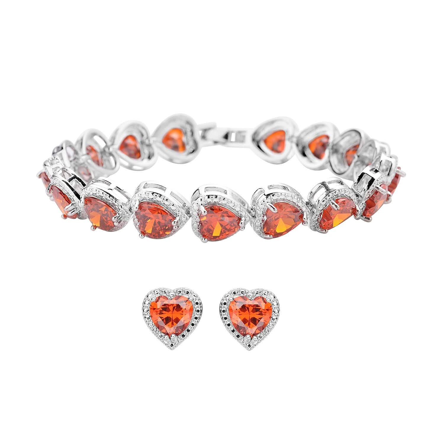 Simulated Orange Red Diamond Heart Shape Bracelet (6.50In) and Stud Earrings in Silvertone 45.00 ctw