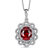 Ceylon Hessonite Garnet and Moissanite 5.50 ctw Pendant Necklace in Rhodium Over Sterling Silver 20 Inches
