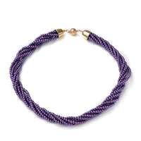 Simulated Purple Pearl Multi Row Twisted Necklace in Goldtone 23 Inches