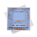 White and Brown Glass Beaded Bolo A New Chapter Morse Code Bracelet in Natural Cotton Cord and 14K YG Over Sterling Silver (Adjustable) - Sticky add to cart bar