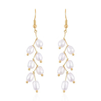 White Freshwater Pearl Dangle Earrings in Goldtone