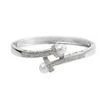 Simulated Pearl and Simulated Diamond Bypass Bangle Bracelet in Silvertone (7.0 In) 1.00 ctw - Sticky add to cart bar