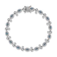Blue Topaz and White Zircon Bracelet in Platinum Over Sterling Silver (7.25 In) 3.70 ctw