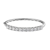 Moissanite Bangle Bracelet in Platinum Over Sterling Silver (6.50 In) 6.25 ctw