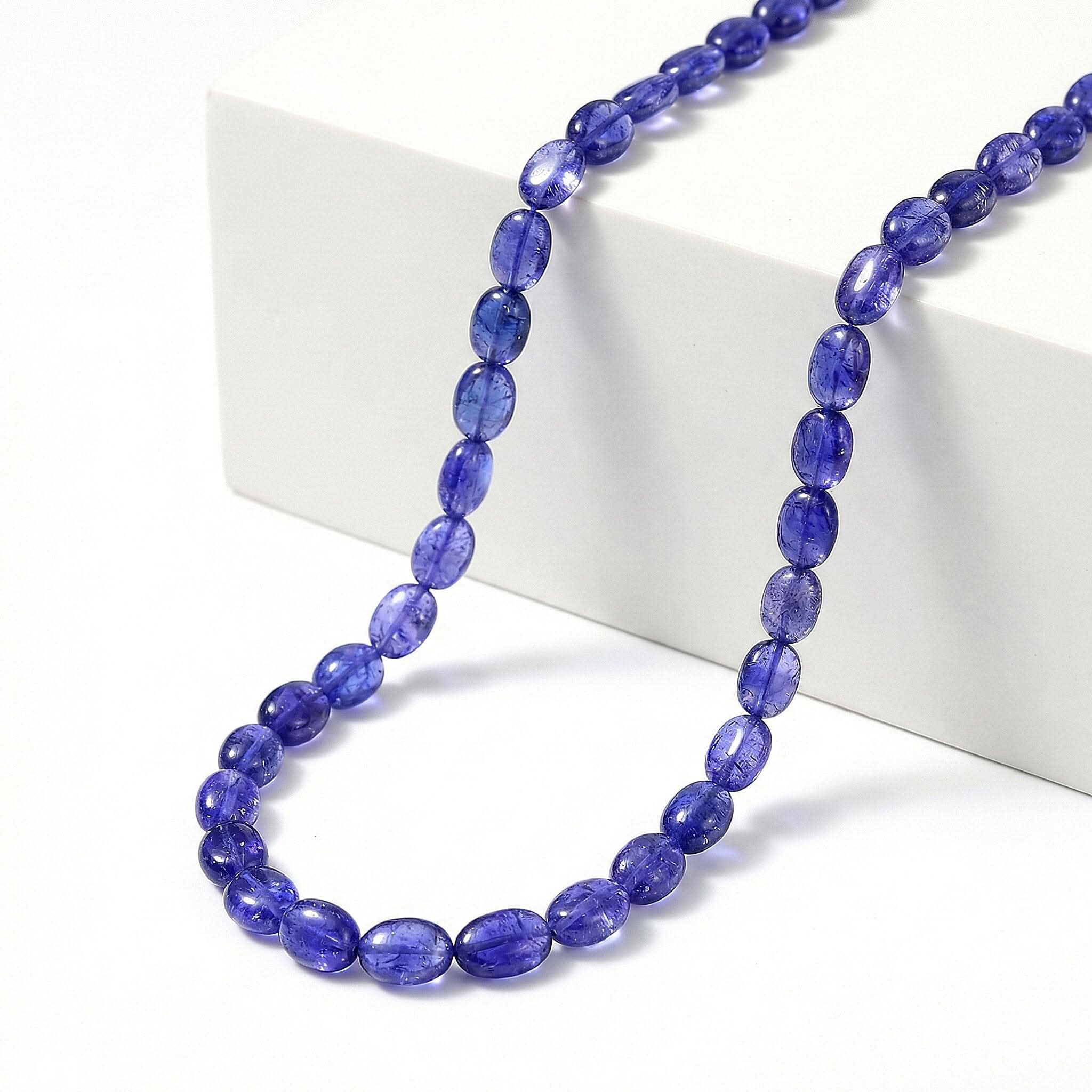 Certified & Appraised Rhapsody 950 Platinum AAAA Tanzanite Beaded Graduated Necklace 18 Inches with 2 Inch Extender 130.00 ctw