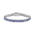 Tanzanite and White Zircon 11.75 ctw Bracelet in Rhodium Over Sterling Silver (7.25 In) - Sticky add to cart bar