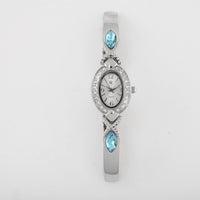 GC Quartz Movement Blue Topaz and Simulated Diamond 3.30 ctw Watch in Silvertone (8.00 In)