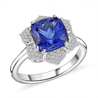 Certified and Appraised Rhapsody AAAA Tanzanite and E-F VS Diamond 4.25 ctw Ring in 950 Platinum 7.65 Grams