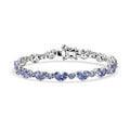 D'Joy Tanzanite 7.65 ctw Heart Bracelet in Rhodium Over Sterling Silver (7.25 In) - Sticky add to cart bar
