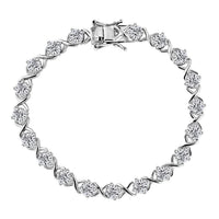 D'Joy Moissanite (Rnd 5mm) XOXO Bracelet in Rhodium Over Sterling Silver (7.25 In) 9.00 ctw