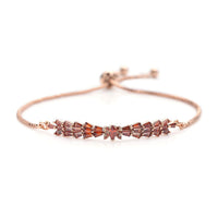 Simulated Garnet Color Diamond Bolo Bracelet in Rosetone 2.00 ctw
